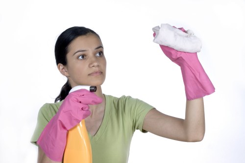 Local cleaning team removing dust after renovation work in SE8