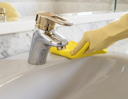 Professional cleaning team working in a SE8 apartment and shared living space